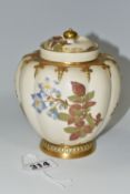 A ROYAL WORCESTER BLUSH IVORY COVERED VASE, of lobed form painted with flowers, purple printed marks