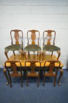 A QUEEN ANNE STYLE WALNUT DINING TABLE, with rounded ends, on cabriole legs, along with a set of six