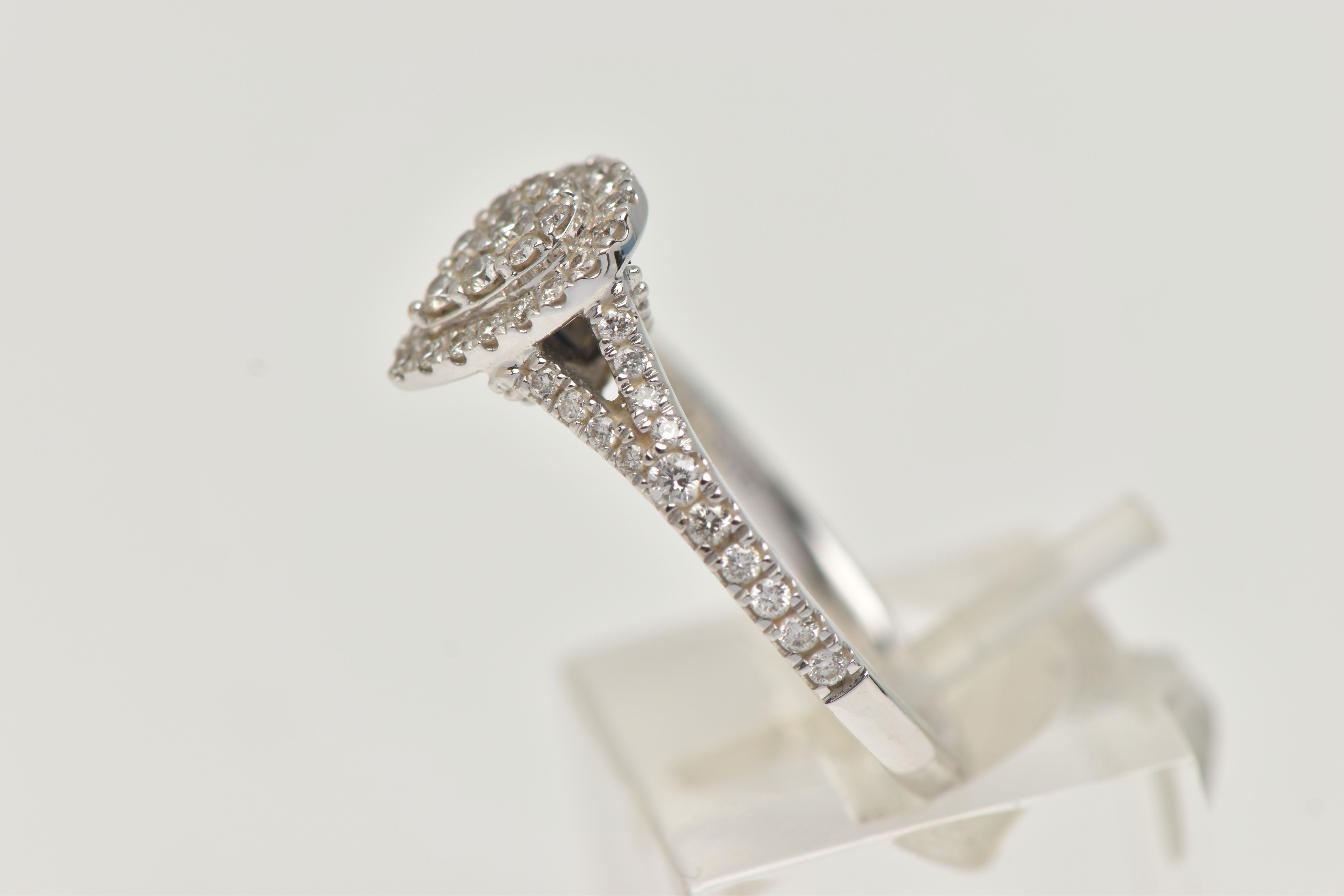 A 'VERA WANG', 18CT WHITE GOLD, DIAMOND SET RING, of a pear cut design, set with a cluster of - Image 4 of 7