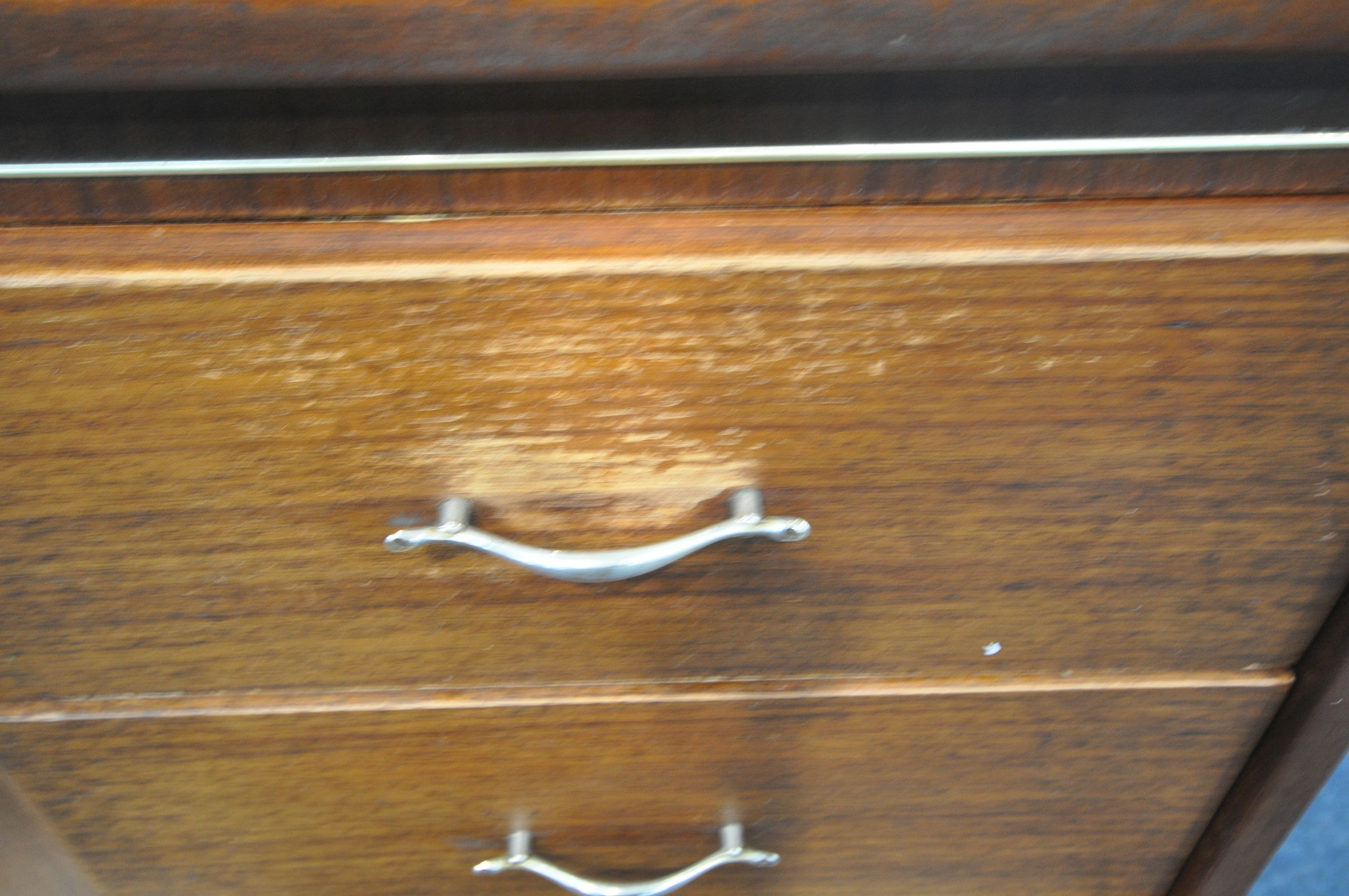 A MID CENTURY BEAUTILITY TOLA AND BLACK HIGHBOARD, fitted with two banks of two drawers, flanking - Image 4 of 8