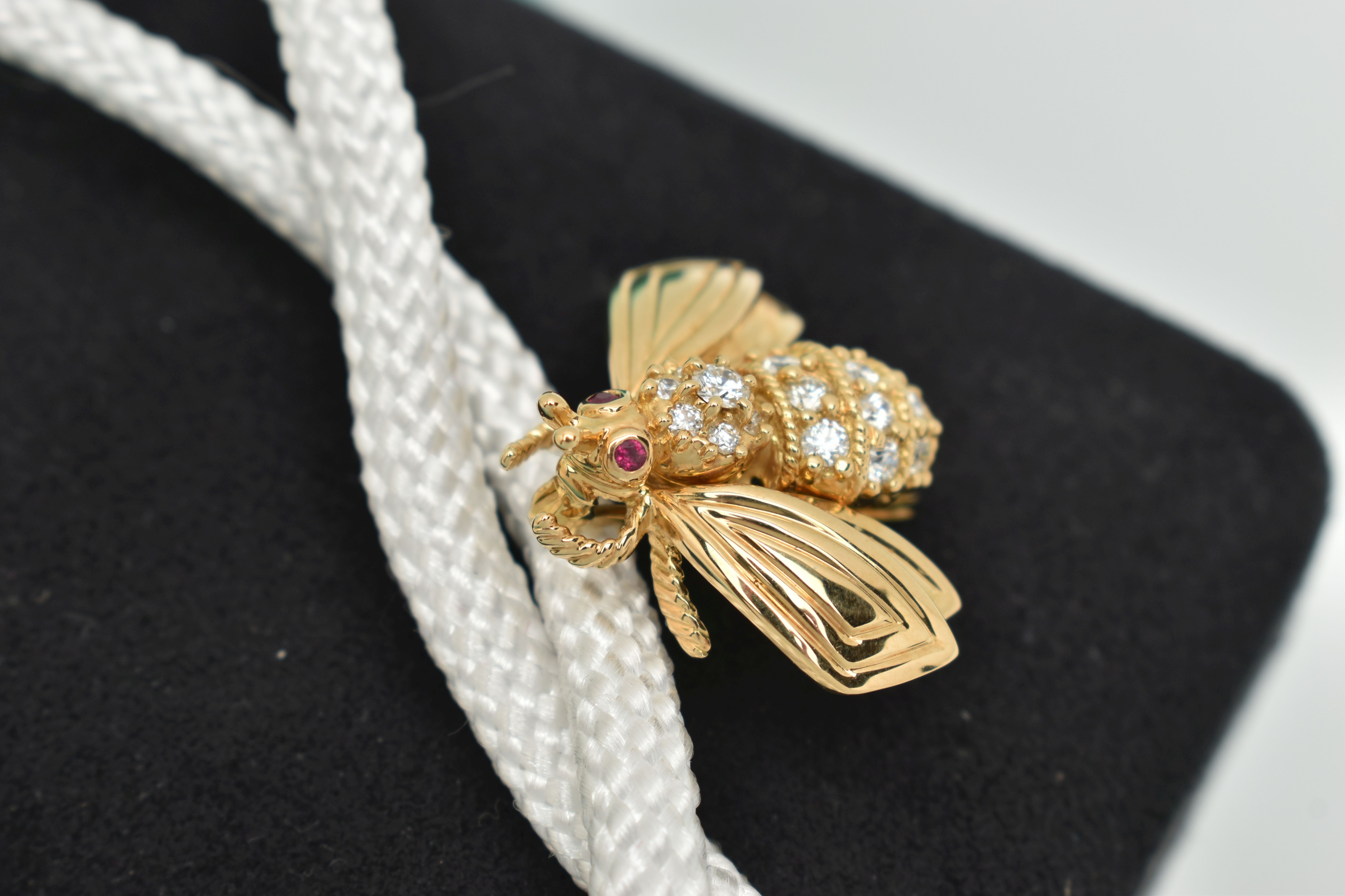 TIFFANY & CO. DIAMOND AND RUBY BEE BROOCH, the body claw set with brilliant cut diamonds, to the - Image 2 of 5