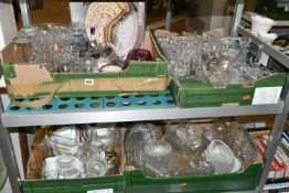 FOUR BOXES OF GLASS WARES, to include a vintage Pyrex casserole dish with black snowflake design