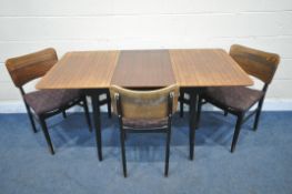 A MID CENTURY TOLA AND BLACK EXTENDING DINING TABLE, with one additional leaf, the additional leaf