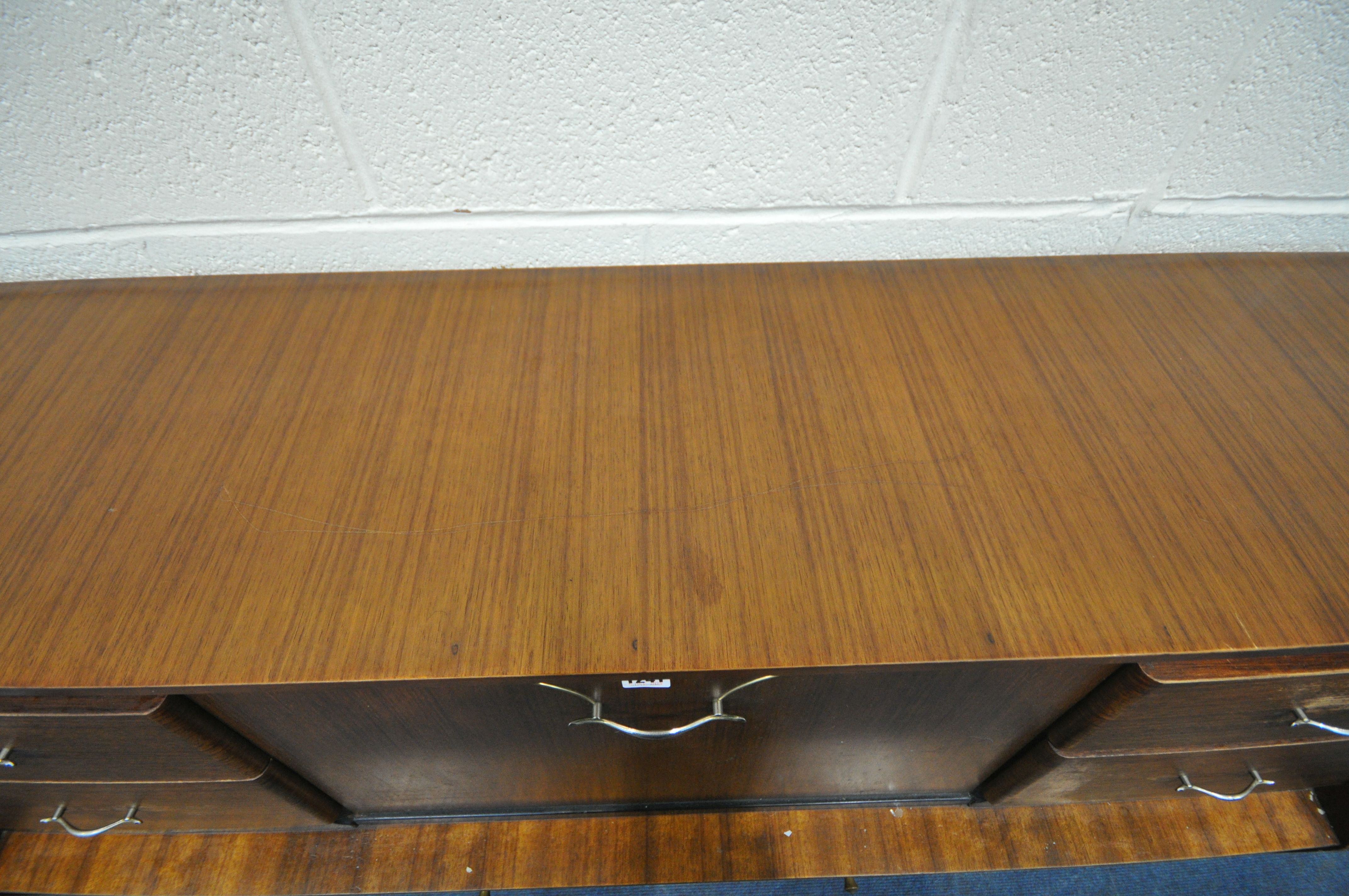 A MID CENTURY BEAUTILITY TOLA AND BLACK HIGHBOARD, fitted with two banks of two drawers, flanking - Image 5 of 8