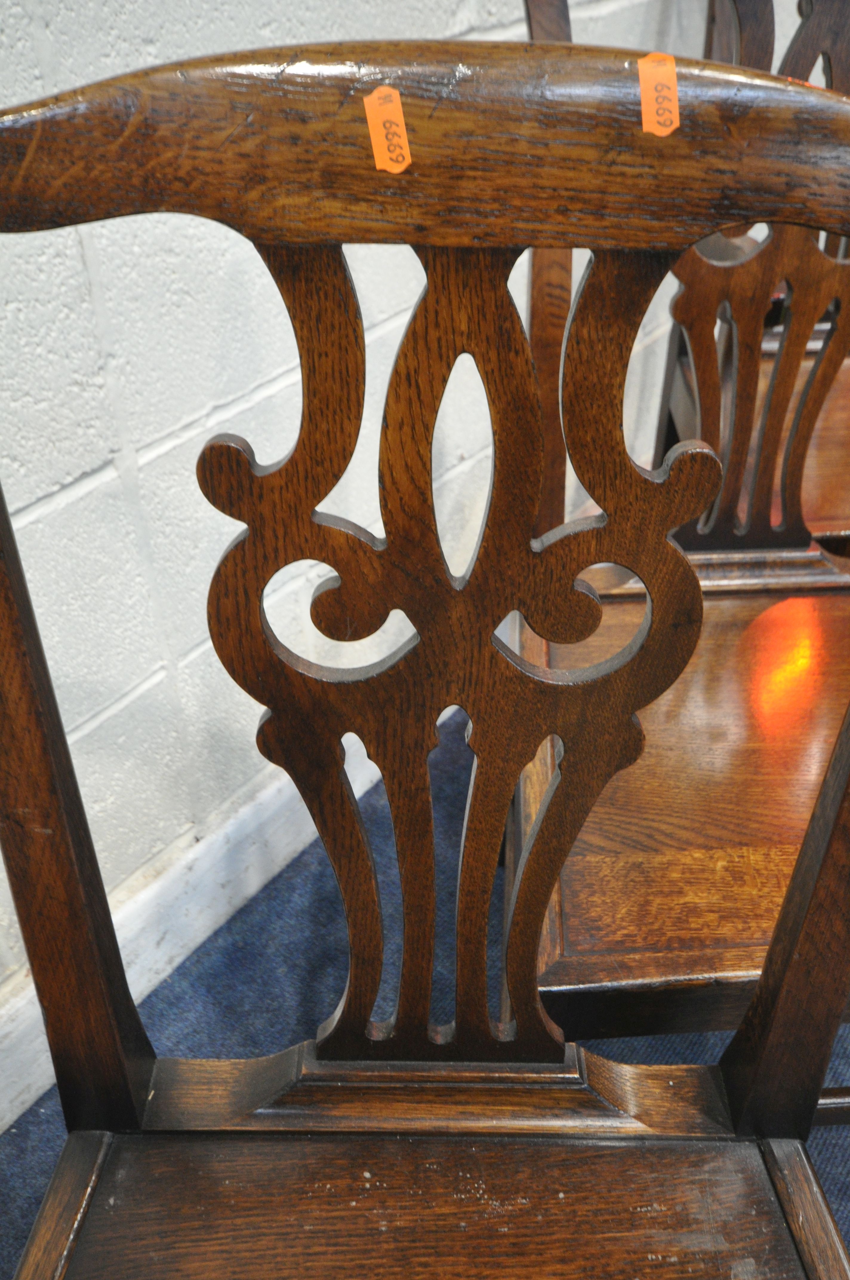 A SET OF SIX REPRODUCTION OAK CHIPPENDALE STYLE CHAIRS, including two carvers, open armrests, with - Image 5 of 5