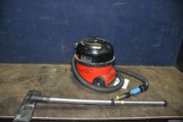 A NUMATIC HVR200 HENRY VACUUM CLEANER with pipe and tube (PAT pass and working)