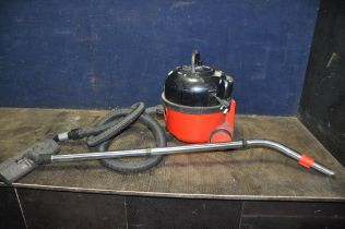 A NUMATIC HVR200 HENRY VACUUM CLEANER with pipe and tube (PAT pass and working)