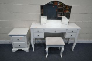 A WHITE DRESSING TABLE, fitted with five drawers, on shaped legs, width 129cm x depth 42cm x