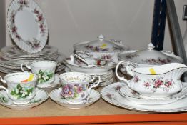 A QUANTITY OF ROYAL ALBERT 'LAVENDER ROSE' PATTERN DINNERWARE, comprising a large oval meat plate (