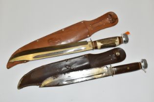TWO HIGH QUALITY GERMAN HUNTING SHEATH KNIVES IN FITTED LEATHER SHEATHS, each bearing the motif of a