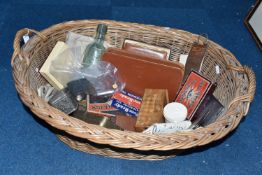 A BASKET OF GENTLEMEN'S AND LADIES' VANITY ITEMS, AND SUNDRIES, to include a wicker laundry basket