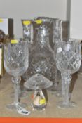 A GROUP OF WELSH ROYAL CRYSTAL, comprising a large diamond cut lead crystal decanter, four air twist