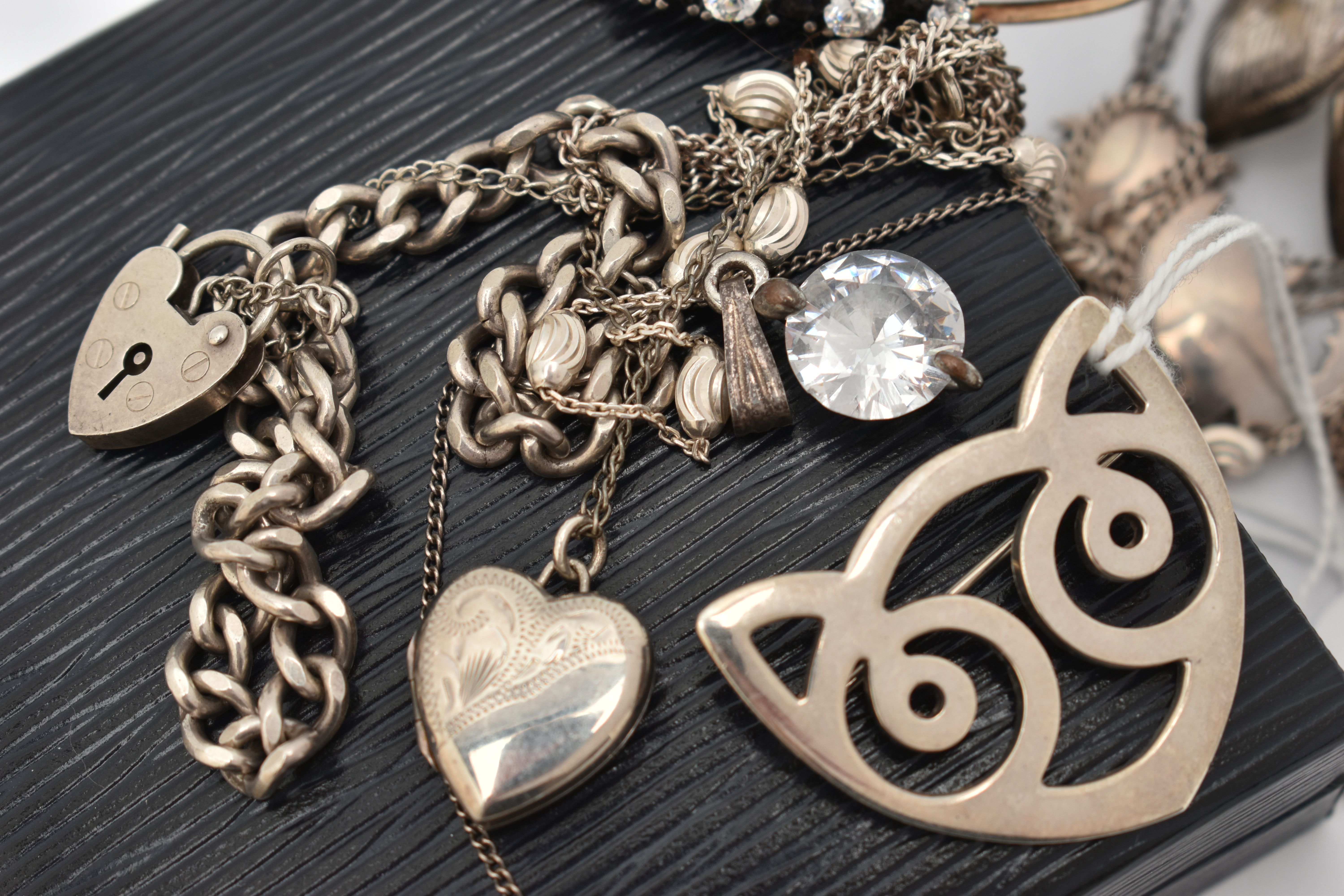A SMALL ASSORTMENT OF JEWELLERY, to include a selection of silver and white metal bracelets and - Image 2 of 3