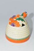 A CLARICE CLIFF 'MARGUERITE' PATTERN PRESERVE POT AND COVER, the cover moulded and painted with