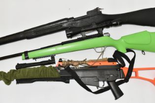 A BB SPRING OPERATED BOLT ACTION AIR RIFLE, fitted with a scope, bearing no make or serial number,
