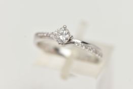 A MODERN 18CT WHITE GOLD DIAMOND RING, a round brilliant cut diamond with faceted girdle,
