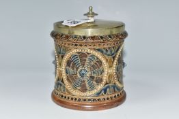 A DOULTON LAMBETH JAR BY FRANK BUTLER, the covered jar having impressed and incised marks to base,