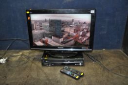 A PANASONIC TX-L26X10B 26in TV with remote and a Panasonic DVD/Video player with remote (4) (both