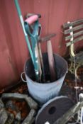 A GALVANISED INCINERATOR, containing a collection of vintage hand garden tools (7)
