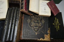 A BOX OF BIBLES AND CHRISTIAN THEMED BOOKS ETC, to include a leather bound Bible with metal