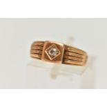 A LATE VICTORIAN DIAMOND SIGNET RING, old cut diamond claw set in a polished square mount,