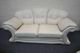 A CREAM LEATHER THREE PIECE LOUNGE SUITE, with swept armrests and buttoned back rests, comprising