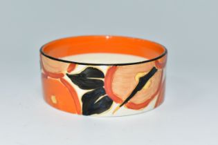 A CLARICE CLIFF 'ORANGE CHINTZ' PATTERN POT, painted with stylised orange flowers with black foliage