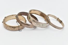 FOUR BANGLES, to include two silver foliage pattern hinged bangles, both fitted with push button