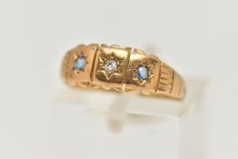 AN EARLY 20TH CENTURY 18CT GOLD GEMSET RING, two circular cut sapphires and an old cut diamond,