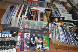 FOUR BOXES OF RUGBY UNION BOOKS & PROGRAMMES to include several hundred match day programmes, a