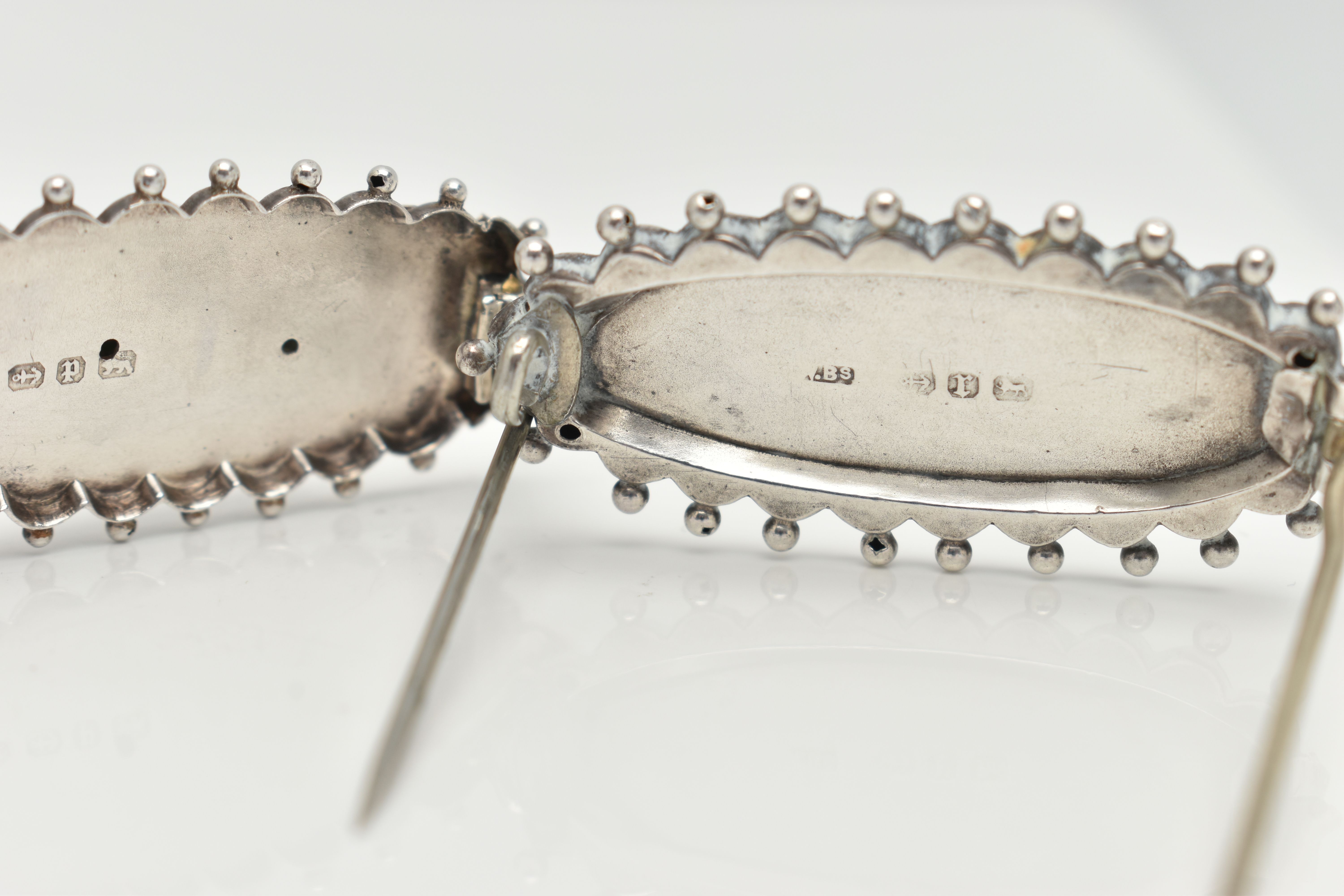 THREE LATE VICTORIAN SILVER SWEETHEART BROOCHES, each of an oval form, applied bead work surround, - Image 3 of 4