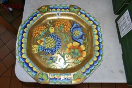 A PAOLO MARIONI ITALIAN POTTERY OCTAGONAL CHARGER, crackle glazed, the gilt ground polychrome