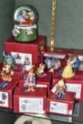 NINE BOXED ENESCO DISNEY TRADITIONS CHRISTMAS ORNAMENTS, designed by Jim Shore, comprising Beauty