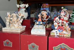 SIX BOXED ENESCO DISNEY SHOWCASE COLLECTION CHRISTMAS FIGURES, from the Disney Traditions collection