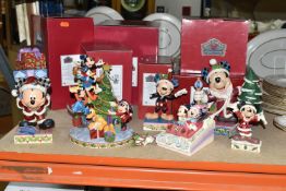 SIX BOXED ENESCO 'DISNEY TRADITIONS' SCULPTURES, comprising 'Here comes Old St Mick', 'Merry tree