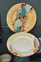 TWO CLARICE CLIFF DINNER PLATES, from her Bizarre range for Wilkinson Ltd, one in 'Orange Capri'