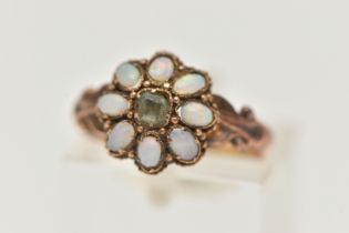 A MID VICTORIAN 15CT GOLD OPAL RING, principally set with a square cut quartz, with a surround of