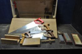 A BESPOKE CARPENTERS TOOLBOX CONTAINING TOOLS including Spear and Jackson saws, a mortice gauge, a