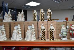 TWELVE BOXED JIM SHORE RESIN CHRISTMAS FIGURES, comprising five 'White Woodland' Father Christmas