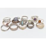 AN ASSORTMENT OF SILVER AND WHITE METAL RINGS, to include two silver gem set rings, both hallmarked,