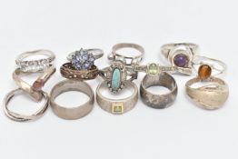 AN ASSORTMENT OF SILVER AND WHITE METAL RINGS, to include two silver gem set rings, both hallmarked,