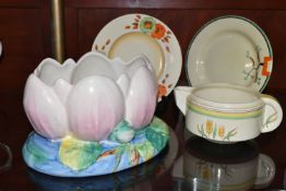 FOUR PIECES OF CLARICE CLIFF CERAMICS, comprising a Newport Pottery pale pink Water Lily