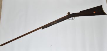 A REPRODUCTION OF A FLINTLOCK RIFLE, lacks ram rod, non-firing, overall length 134cm, rusted
