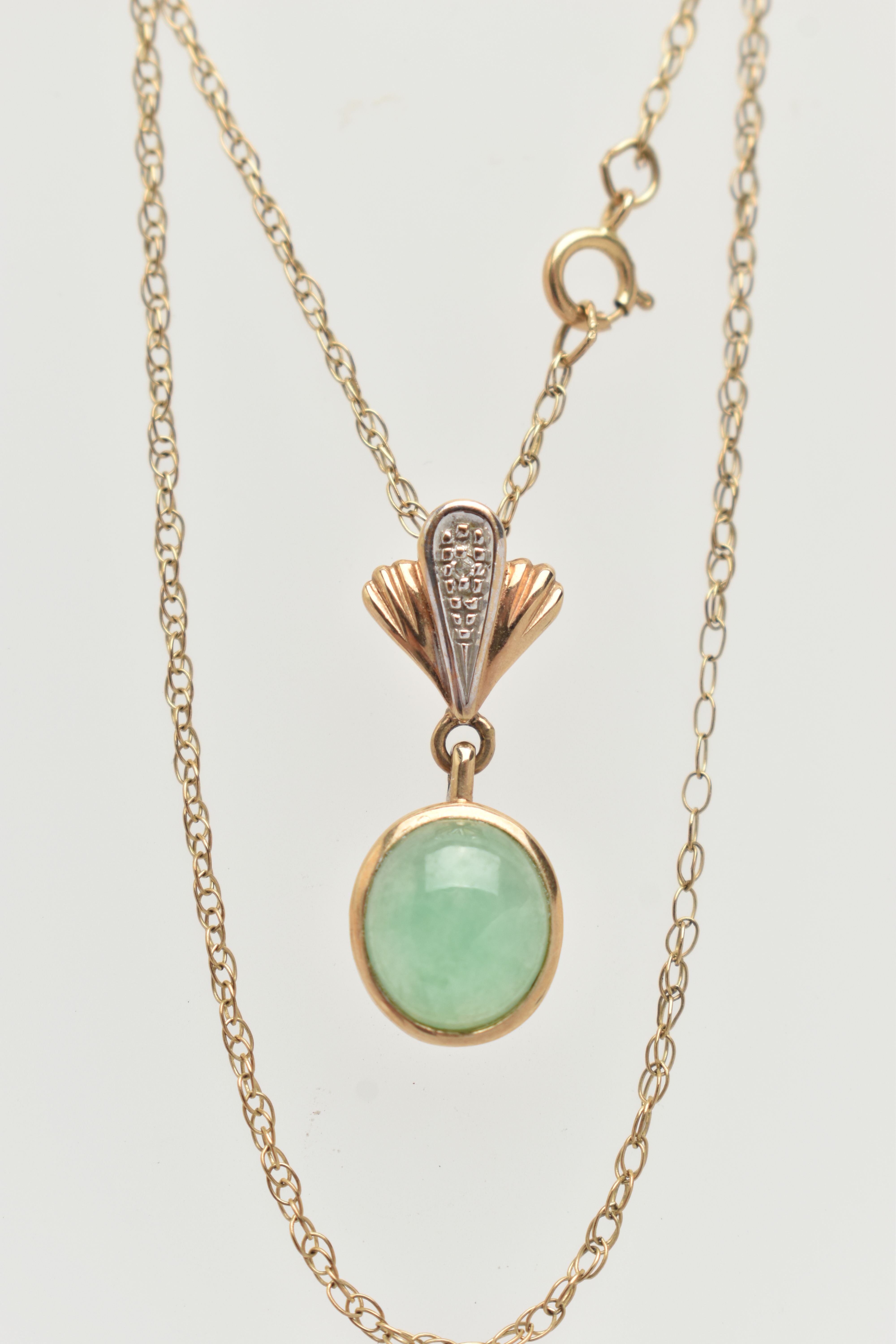 A YELLOW METAL GEMSET NECKLACE, an oval cabochon jade stone, collet set in yellow metal, leading - Image 2 of 4