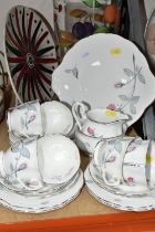 A ROYAL ALBERT 'TRENT ROSE' PATTERN TEA SET, comprising cake plate, milk jug, sugar bowl, six tea