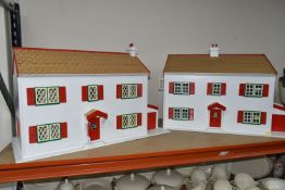 TWO WOODEN DOLL'S HOUSES, modelled as a detached house with side garage, front opening, no furniture