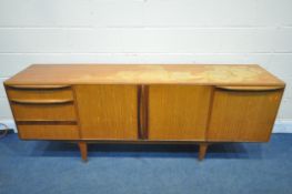 A MID CENTURY TEAK MCINTOSH SIDEBOARD, fitted with three drawers, two cupboard doors and a fall