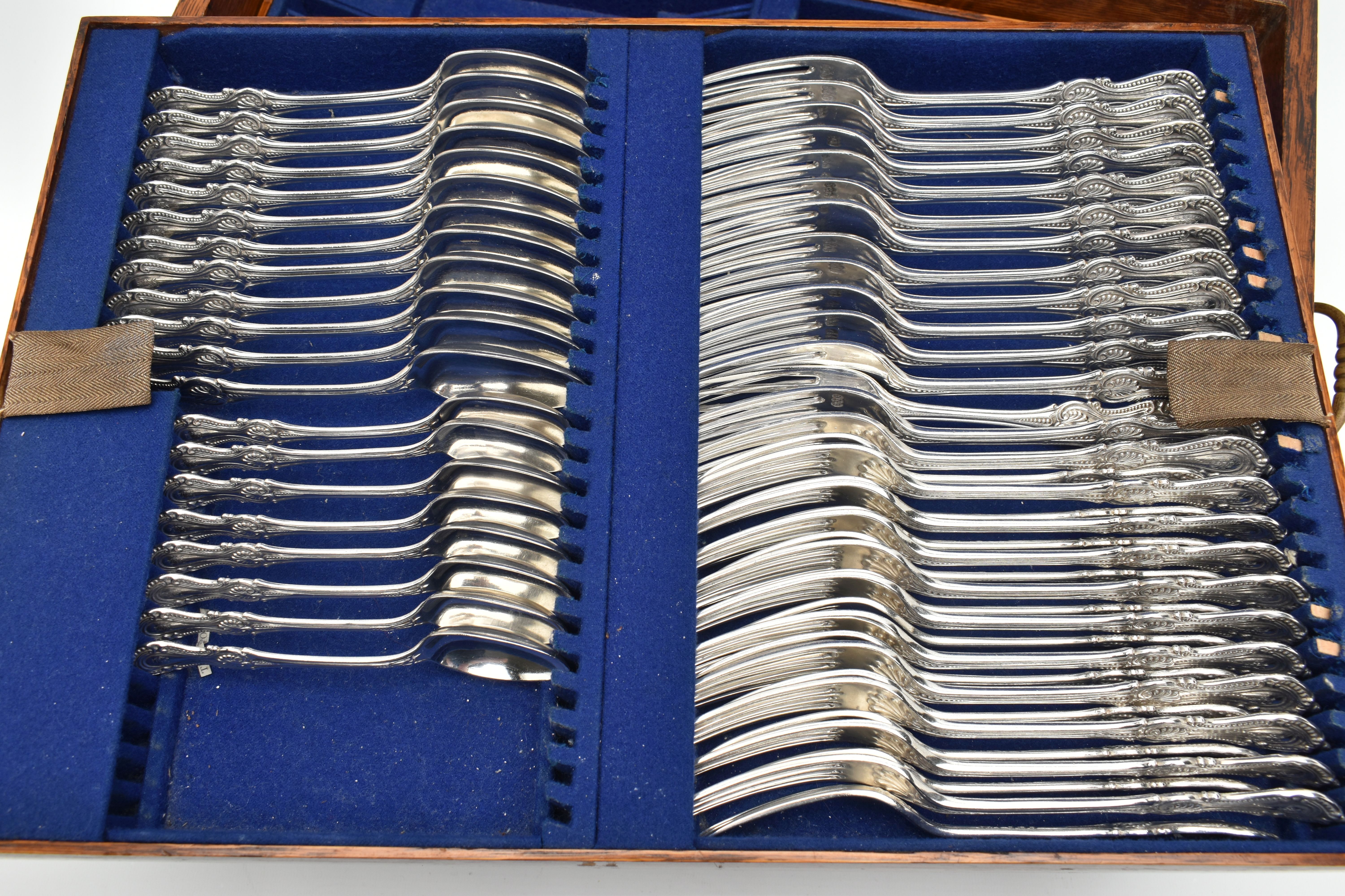 A LATE 19TH CENTURY OAK CASED THREE TIER CANTEEN OF LATE 19TH AND EARLY 20TH SILVER FLATWARE BY - Image 2 of 12