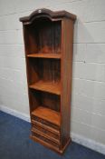 A HARDWOOD OPEN BOOKCASE, with two fixed shelves and three drawers, width 62cm x depth 31cm x height