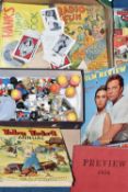 A BOX OF CERAMIC FIGURES, TOYS AND BOOKS, to include eight Robertsons Jam figures, Wade Whimsies